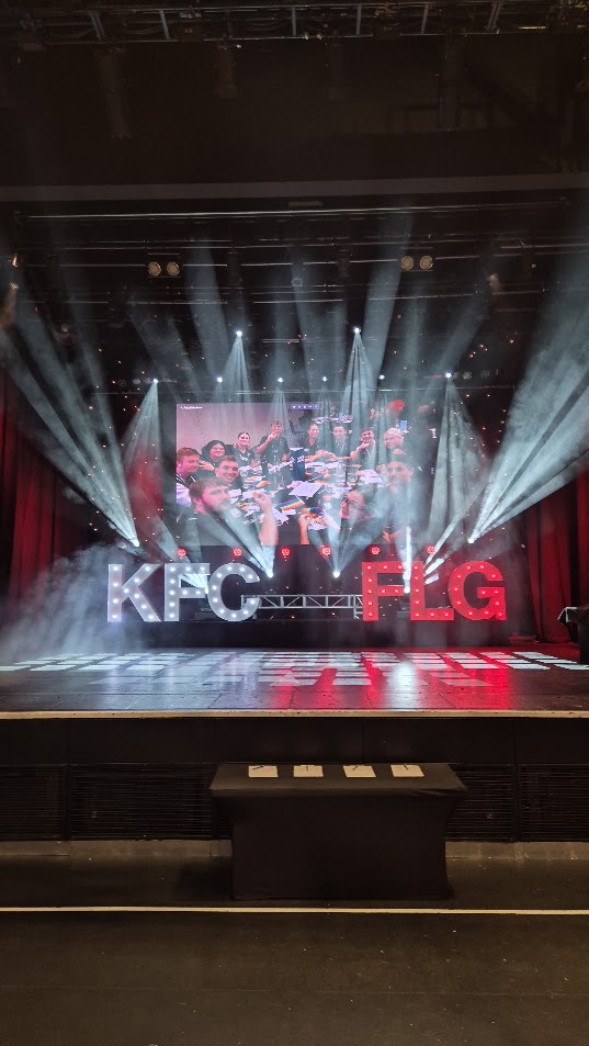 The Stage is Full of Lights, but KFC FLG is prominent.