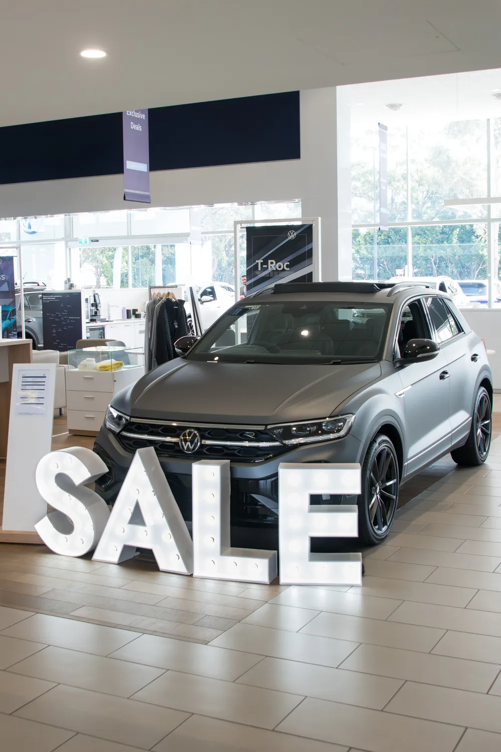 Bold and Obvious Sale display. Better than a traditional sign! And it's lit up in LED Lights